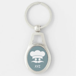 Beställnings- färg- & monogramnyckelring för kock ovalt silverfärgad nyckelring