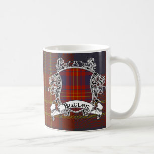 Betjänttartanen skyddar kaffemugg