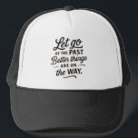 Better Things Trucker Hat — Let Go of the Past Quo Keps<br><div class="desc">Keep your head up and your heart hopeful! This “Let go of the past. Better things are on the way.” hat is the perfect reminder to stay positive and trust the journey. Great for daily wear, outdoor walks, or as an encouraging gift for anyone choosing to move forward. Simple, stylish,...</div>