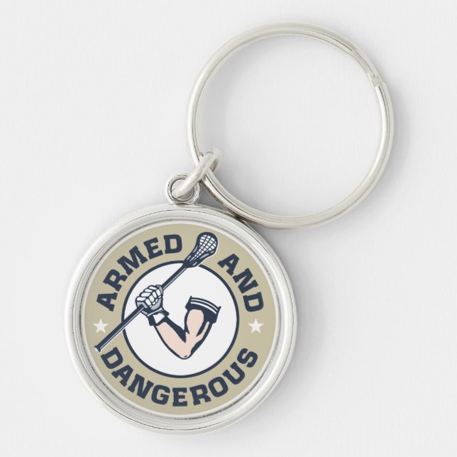 Beväpnad och farlig Lacrosse Keychain Rund Silverfärgad Nyckelring (Framsidan)