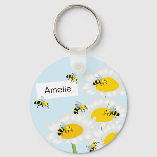 Bi på blomman Keychain - blåttbakgrund Nyckelring