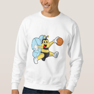 Bie som basketspelare med basketboll lång ärmad tröja