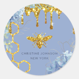 biets logotyp och blåhaj runt klistermärke