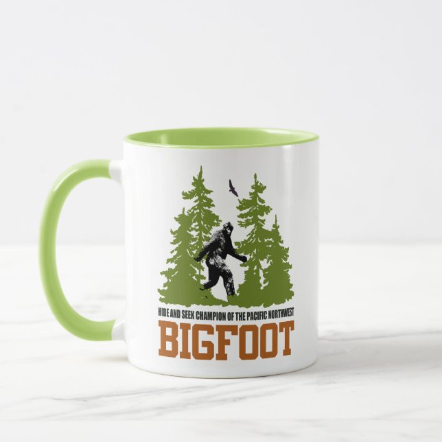 Bigfoot Gömmer och Seek Champion Pacific Northwest Mugg (Vänster)