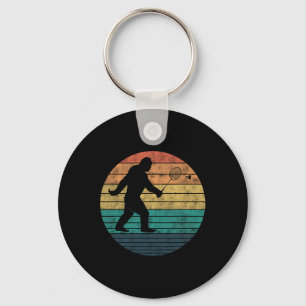 Bigfoot spelar Badminton Shuttle Funny Badminton Nyckelring