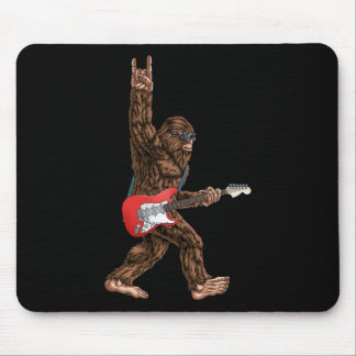 Bigfoot spelar en elektrisk gitarr Sten på Sasquat Musmatta