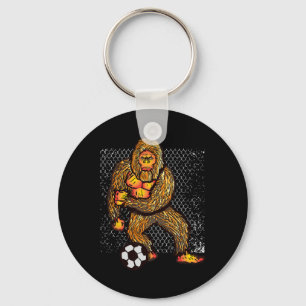 Bigfoot spelar fotboll för fotbollsspelare Roligt Nyckelring