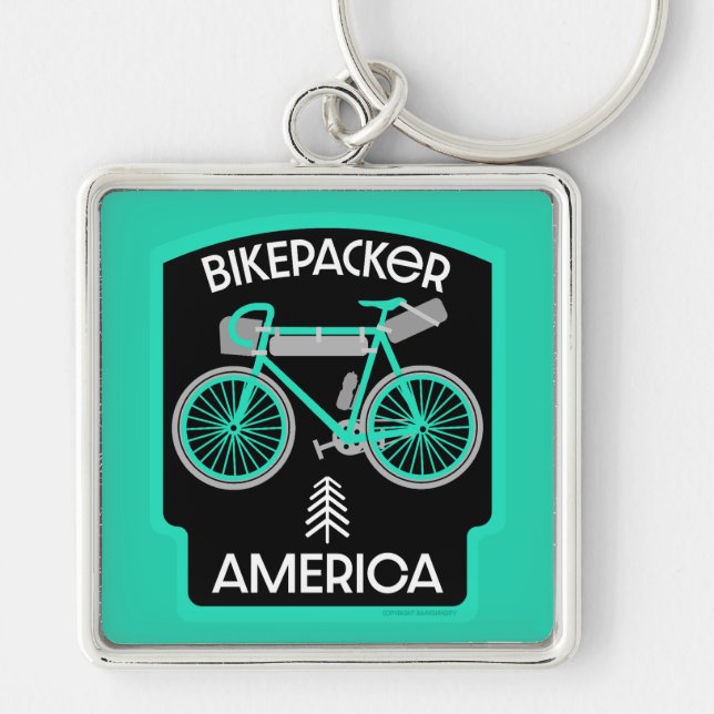 Bikepacking America Fyrkantig Silverfärgad Nyckelring (Framsidan)
