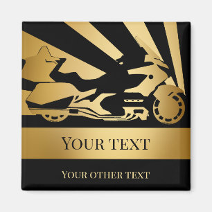 Biker guld av motorcykelmotorcykel i Magnet