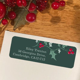 Bild av jultomte och grönt av röda bär returadress etikett
