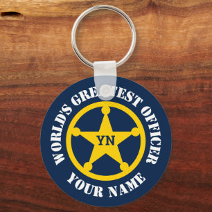 Bild av polisman vid anpassningsbar tillsatta laga nyckelring