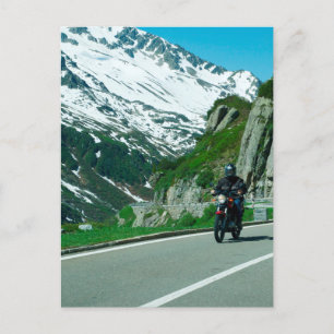 Bild på motorcykelförare i snöberg vykort