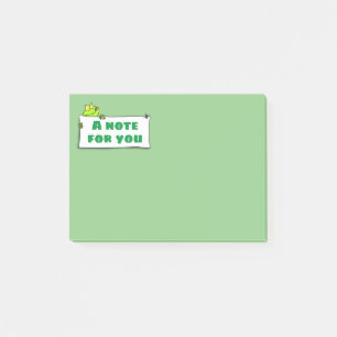 Bild på tecknaden för grodlumpen för grönt av ljus post-it block