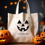BILLIGT JACK O LANTERN PUMPKIN ANSIKTE ANPASSAT NA TYGKASSE<br><div class="desc">Vi firar Halloween i i stil med vår exklusiv pumpa i ansikte, ett mångsidigt tillbehör som kan anpassas för att matcha ditt unika stil. Lägg till ETT NAMN ELLER ETT ANPASSNINGSBAR-MEDDELANDE för att göra det helt ditt. Den här väskan har en vismisk pumputformning som sömlöst blandar Halloween-roligt- och fläckaspekter. Oavsett...</div>