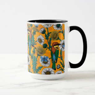Bin, blå fjärilar och daisy på orange mugg