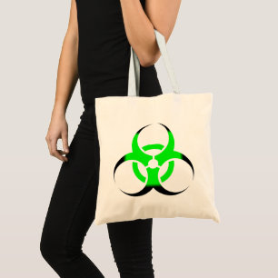 Biologisk grönt av symbol och svart tygkasse