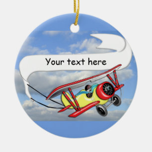 Biplane som bogserar baneranpassade julgransprydnad keramik