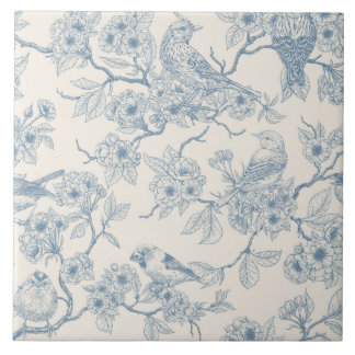 Birds and cherry blossom in blue and off white kakelplatta