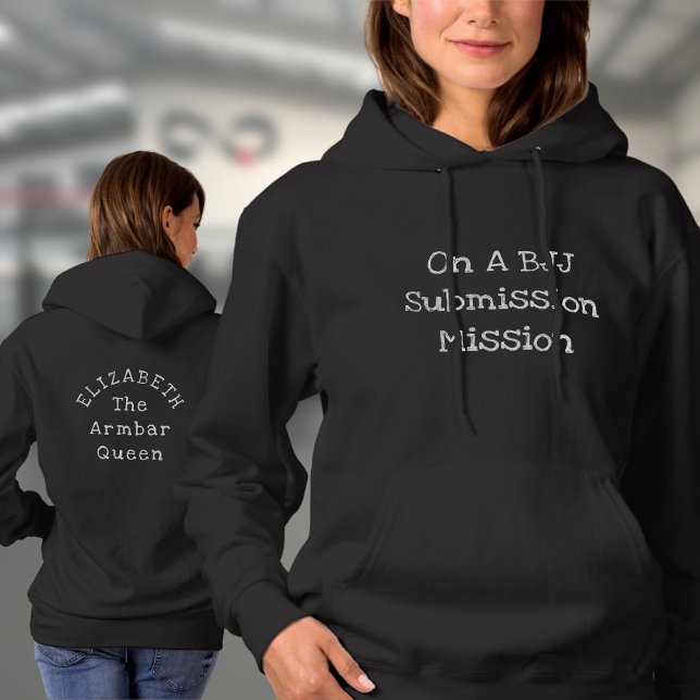 BJJ designa din egen Namn-malltext, Anpassningsbar T Shirt (Woman's BJJ black hoodie with front and rear prints worn by a female model in the gym)