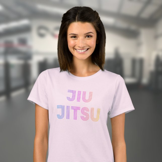 BJJ Funky Brazilian Jiu Jitsu Rosa Women's T Shirt (Light pink women's jiu jitsu t-shirt worn by a female model in the gym.)