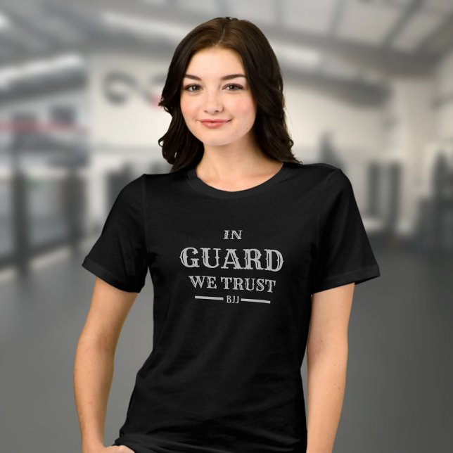 BJJ in Guard We Trust Brazilian Jiu Jitsu Woman's T Shirt (Woman's Brazilian Jiu Jitsu T-shirt in black on a female model in a gym. )