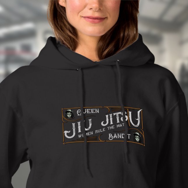 BJJ Queen Bandit Womens Brazilian Jiu Jitsu T Shirt (Woman's black BJJ hoodie worn by a female model in the gym)