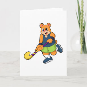 Björn på hockey med hockeyklubba kort