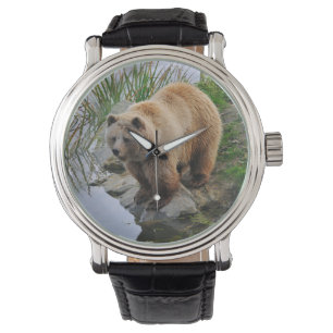 Björn vid en sjö armbandsur