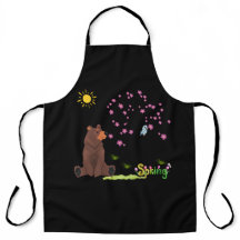 Björnen observerar det blommande träd och fågeln