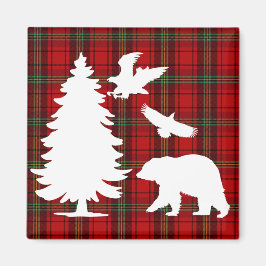 Björnhäst vid gräs träd vid rödsvarta tartan magnet