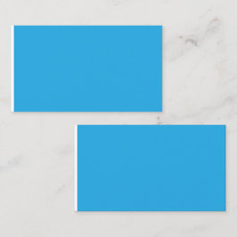 blå bakgrund med en svart och vit katt