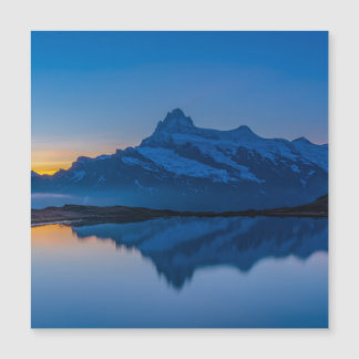 Blå Bergssolnedgång Vattenreflektion