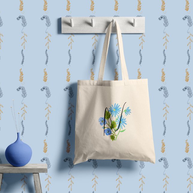 Blå blomma i akvarell med din initial. tygkasse (Skapare uppladdad)