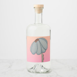 Blå blomma med rosa bakgrund spritflaskor etikett