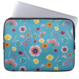 Blå blommor i blå laptop sleeve