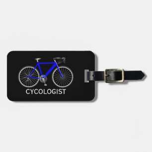 Blå cykel på svart bagagebricka