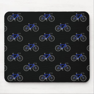 blå cykel på svart musmatta