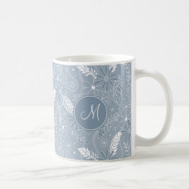 Blå fjädrar från dammsuga fjädrar från blommor i m kaffemugg