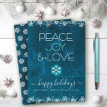 Blå fred Joy Kärlek Snowflake Typography Simple Julkort<br><div class="desc">"Fred, glädje och kärlek." En roligt, lekfull, snöflingande illustration och modern typografi på en rik, djupa, blå marmorbakgrund hjälper dig att tränga in i julhelgen. Ytterligare vit snöflingor och konfekti ger ram kortet. En vit snöflinga mönster övertäcker den djupa marmorblå vattenfärgen på baksidan. Känn helgdagarnas värme och glädje när du...</div>