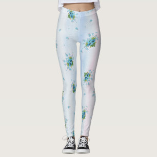 Blå glöm-jag-inte på en mjuk rosa-blå leggings