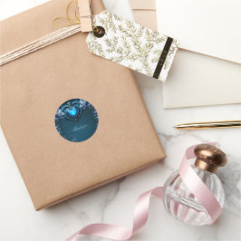 Blå gotskt hjärta omgivet av magiska blommor runt klistermärke