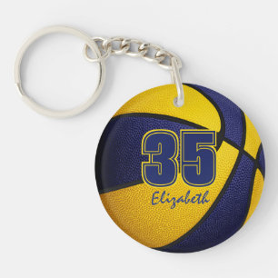 Blå guld-ungar tonåring team färg ger basket i