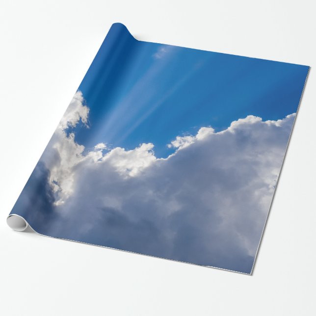 Blå himmel med vitmoln och strålen av sunshine. presentpapper (Utrullad)