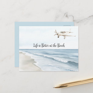 Blå himmel vit flygplansstrand ocean kust vykort