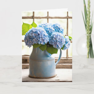 Blå Hydrangea årsdagsbukett i fönster Kort