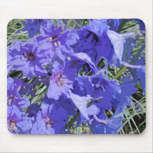 Blå Larkspur-blomman på en munspad Musmatta