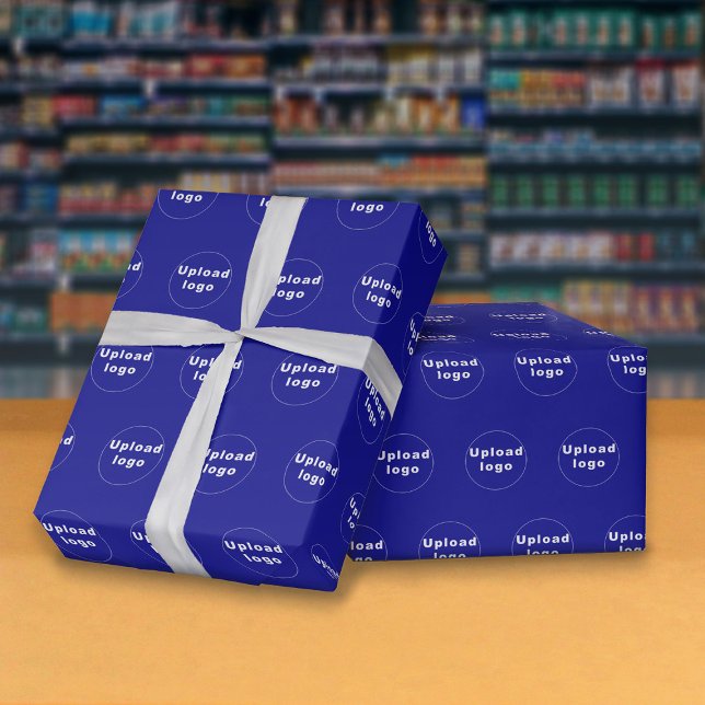 Blå Logotyp för sömlös Mönster-, Papper insvällnin Presentpapper (Seamless pattern of your business logo on blue wrapping paper.)