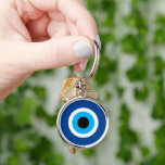 Blå Mati Evil Öga, turkursbetalningskedja Rund Silverfärgad Nyckelring<br><div class="desc">Blue Mati Evil Öga har tur som charmpremiumgåva till nyckelkedjan Blue Mati Evil. Blåmati Grekiska/turkiska nazar ikon för skydd och lycka till. Anpassningsbar för hem,  party,  bröllop,  pub,  restaurang,  kontor osv.</div>