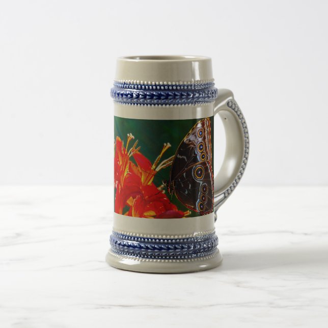 Blå morpho fjäril på Crocosmia Lucifer blommor Sejdel (Framsida höger)
