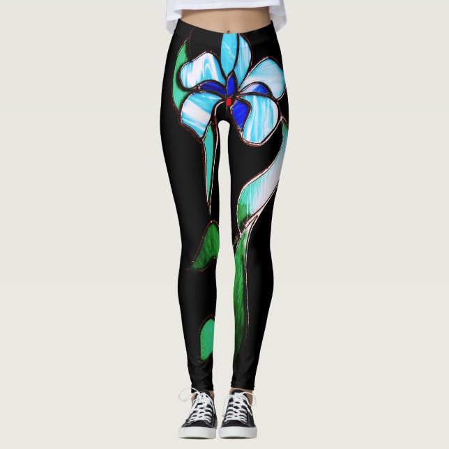 Blå nyblommor av grönt på svart leggings (Framsida)